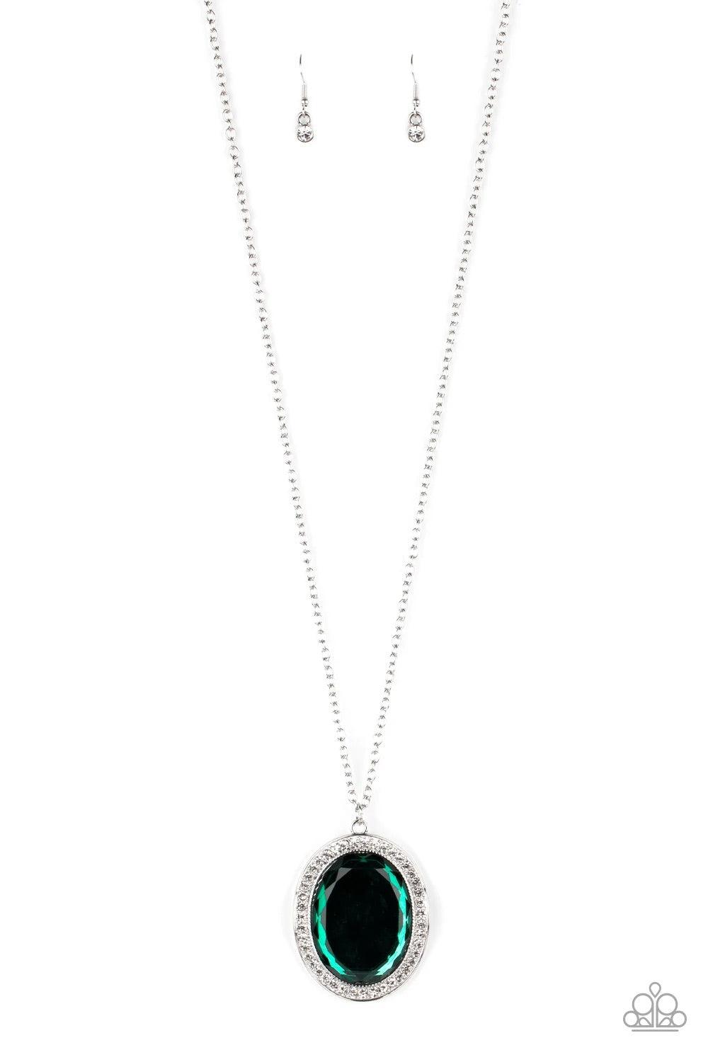 Paparazzi Accessories REIGN Them In - Green A dramatically oversized green gem is pressed into the center of a curvy silver frame dusted in dainty white rhinestones, creating a glamorous pendant at the bottom of a lengthened silver chain. Features an adju