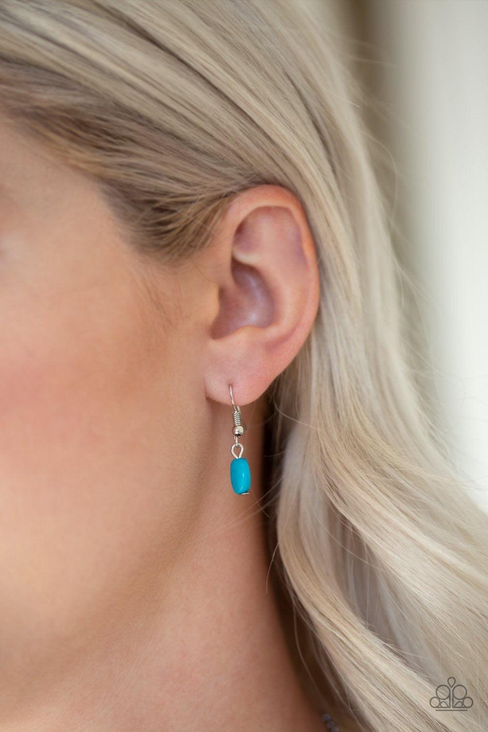 Paparazzi Accessories Demi Diva - Blue Featuring round, teardrop, and oval shapes, a collection of faceted blue beads are pressed into sleek silver frames. The colorful frames link below the collar creating a vibrant fashion. Features an adjustable clasp