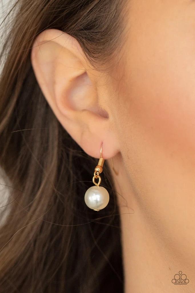 Paparazzi Accessories Nautical Novelty - White Classic white pearls and faceted gold beads alternate along an invisible wire below the collar, creating a timeless twist. Features an adjustable clasp closure. Sold as one individual necklace. Includes one p