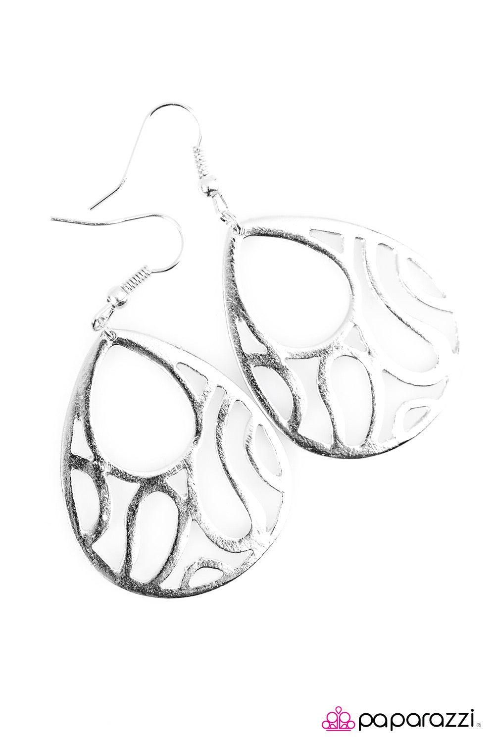 Paparazzi Accessories Waikiki Waves - Silver Brushed in a glistening finish, silver filigree waves across a teardrop lure in a whimsical fashion. Earring attaches to a standard fishhook fitting. Jewelry