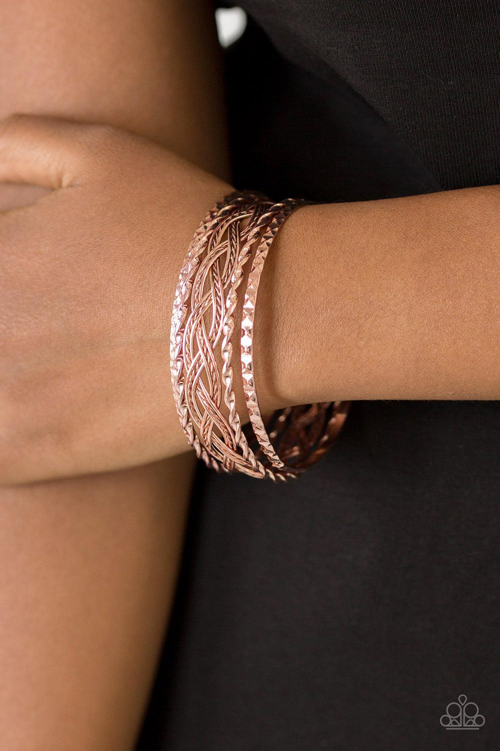 Paparazzi Accessories Straight Street - Rose Gold Featuring smooth and textured finishes, mismatched rose gold bangles glide along the wrist for a causal fashion. Jewelry