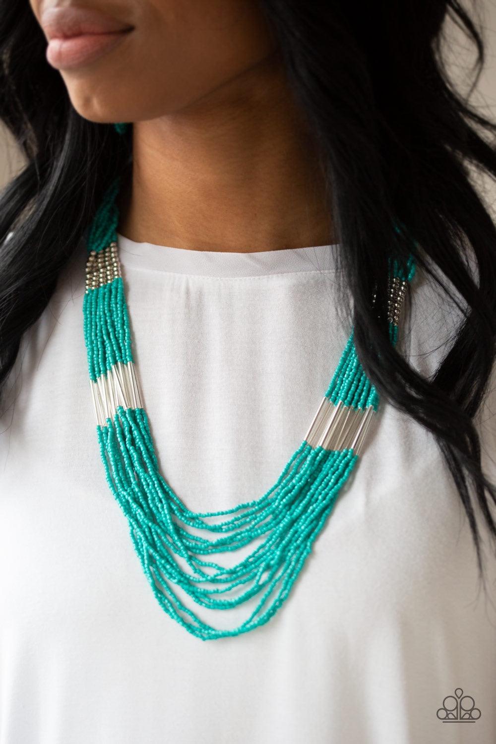 Paparazzi Accessories Let It BEAD - Blue Countless strands of turquoise seed beads drape across the chest in a layered cascade. Accented with classic silver beading, glassy cylindrical beading is added to the display for a radiant finish. Features an adju