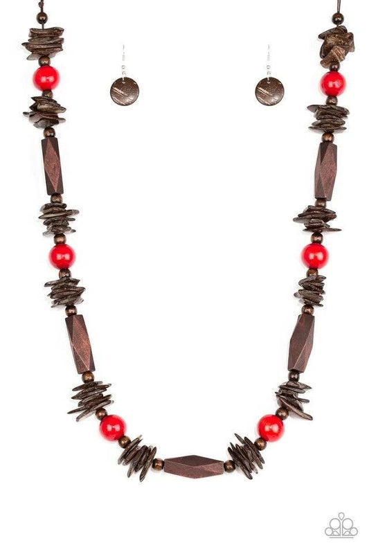 Paparazzi Accessories Cozumel Coast - Red Featuring round, faceted, and distressed finishes, mismatched brown wooden beads are threaded along shiny brown cording. Fiery red wooden beads trickle between the earthy accents, adding a colorful finish to the s