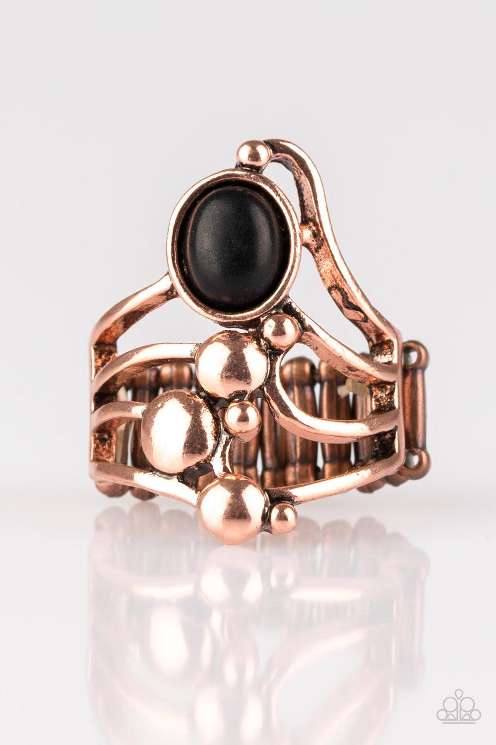 Paparazzi Accessories Wanderlust Wanderer ~Copper Dotted with bubbly copper frames, glistening copper bars swoop across the finger. An earthy black stone is pressed into the top of the whimsically stacked frame for a seasonal finish. Features a stretchy b