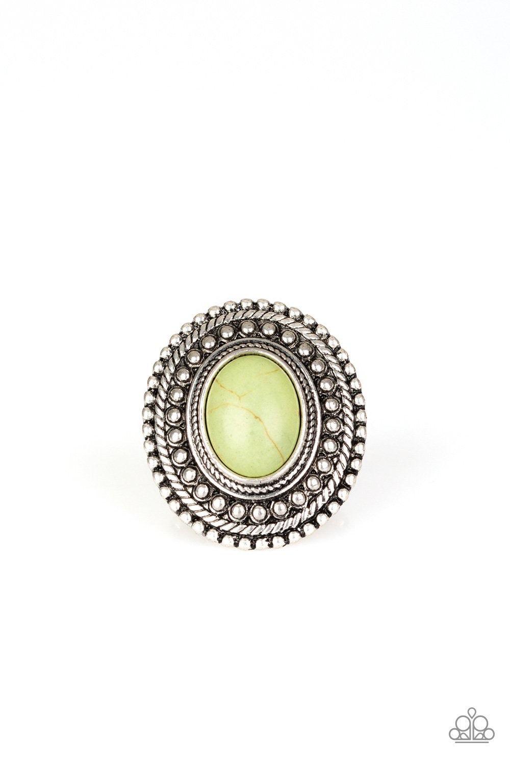 Paparazzi Accessories Terra Terrain - Green Chiseled into a tranquil oval, a refreshing green stone is pressed into the center of a shimmery silver frame spinning with studded patterns for a seasonal flair. Features a stretchy band for a flexible fit. Jew