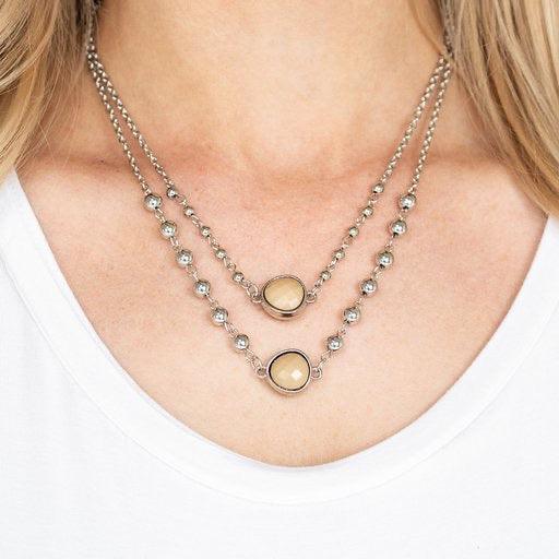 Paparazzi Accessories Colorfully Charming - Brown Featuring asymmetrical teardrop shapes, faceted brown beads layer below the collar. Dainty silver beads adorn the uppermost silver strand, while slightly larger silver beads dot the lowermost strand for a