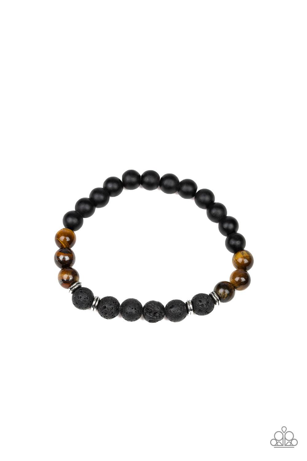 Paparazzi Accessories Karma - Brown Infused with dainty silver accents, a collection of black lava rock, earthy tiger's eye stones, and smooth black stone beads are threaded along a stretchy band around the wrist for a seasonal style. Jewelry