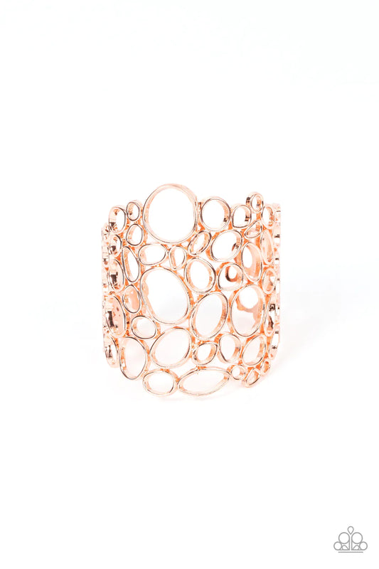 Paparazzi Accessories All Turned Around - Copper Varying in shape and size, asymmetrical shiny copper circular frames delicately connect into an effervescently abstract cuff around the wrist. Sold as one individual bracelet. Jewelry