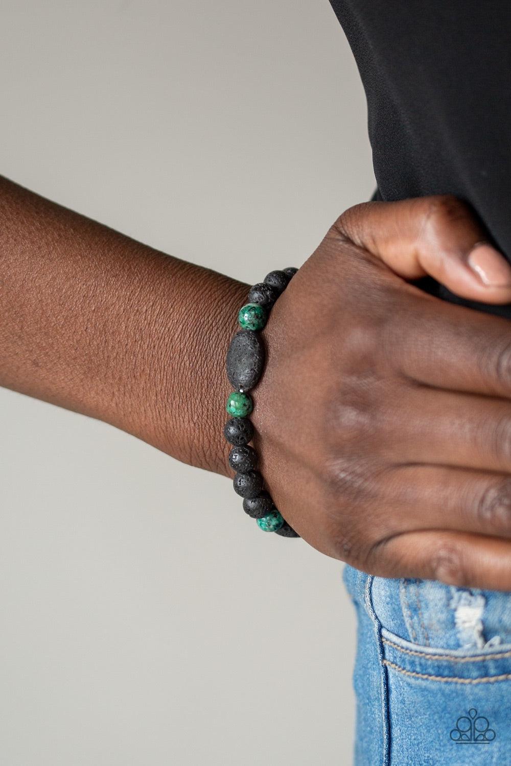 Paparazzi Accessories A Hundred And Zen Percent - Green A collection of black lava rocks and earthy green stone beads are threaded along a stretchy band around the wrist for a seasonal look. Jewelry