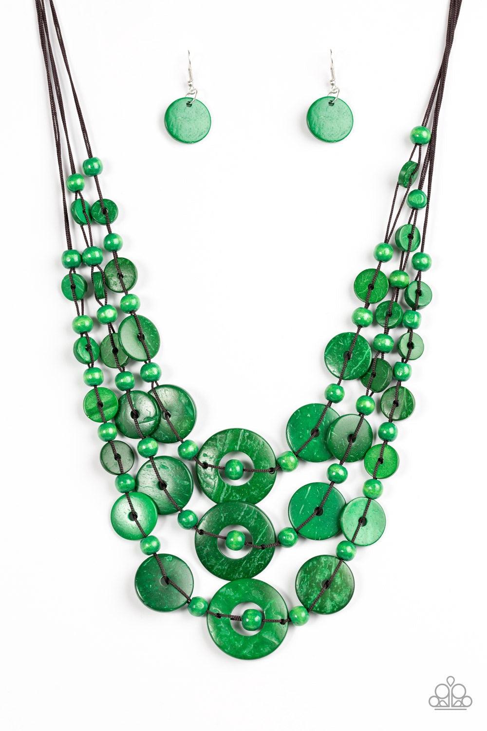 Paparazzi Accessories Bali Boardwalk - Green Brushed in a distressed finish, refreshing green wooden beads and discs trickle along three strands, creating a summery look down the chest. Features a button loop closure. Necklaces