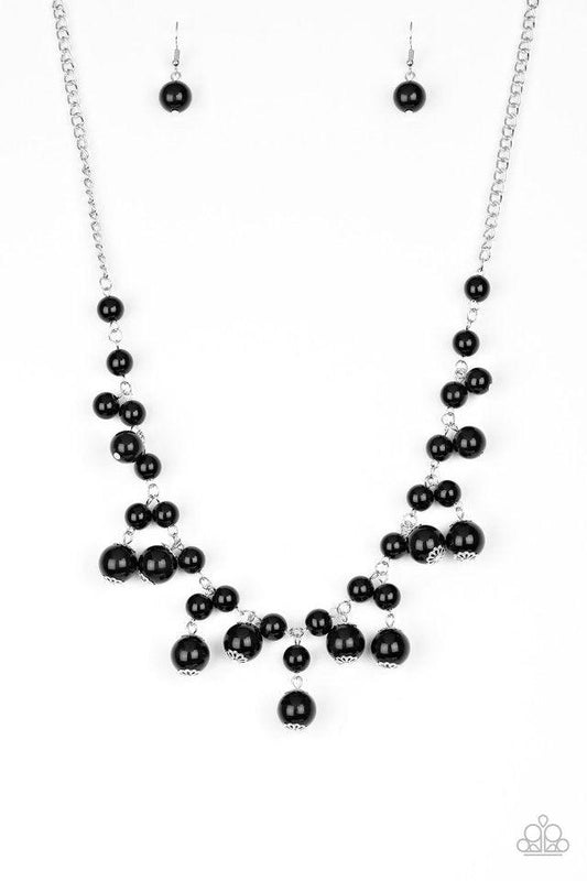 Paparazzi Accessories Soon To Be Mrs. - Black Varying in size, bubbly black beads swing from the bottom of a classic strand of black beads, creating a refined fringe below the collar. Features an adjustable clasp closure. Sold as one individual necklace.
