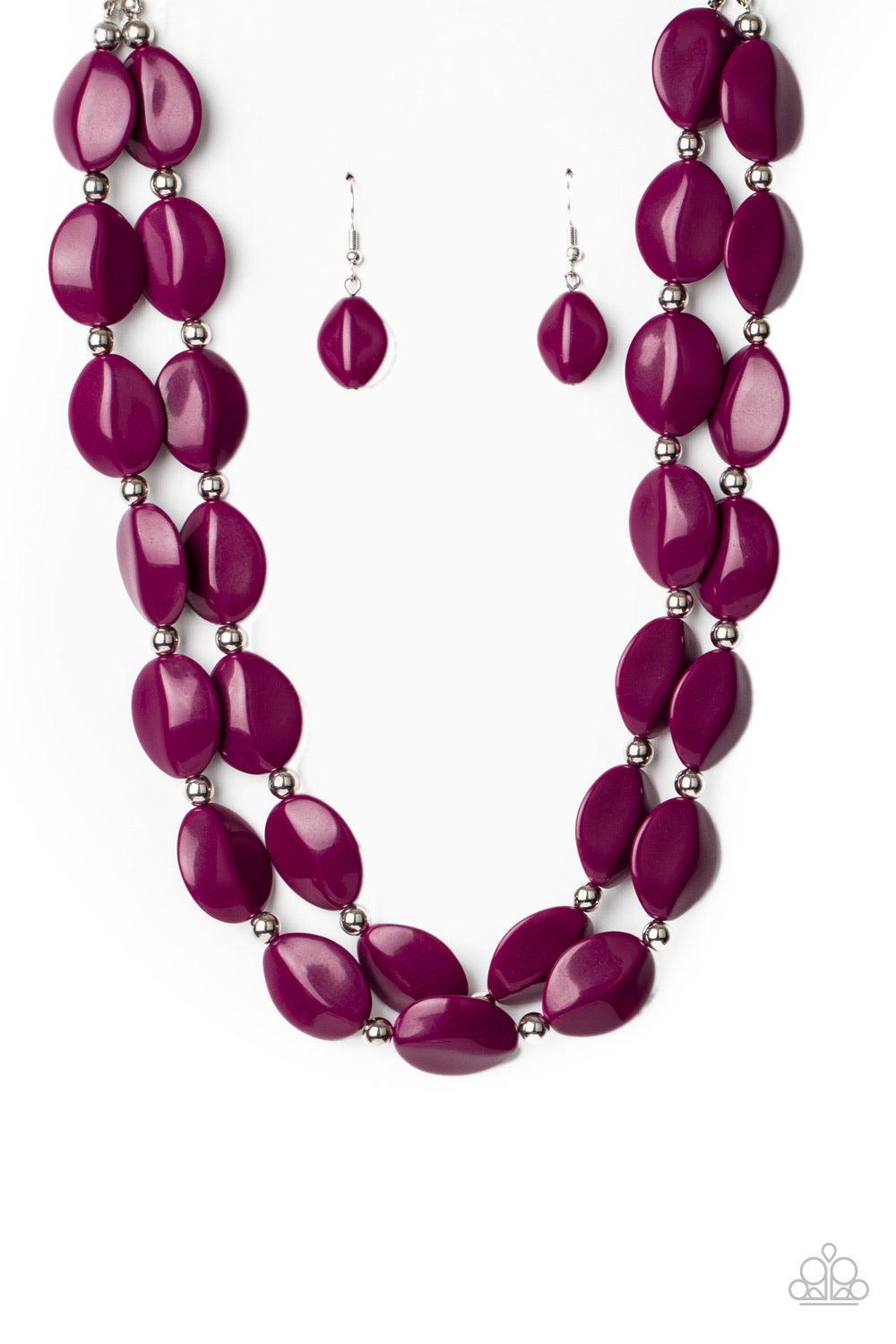 Paparazzi Accessories Two-Story Stunner ~Purple Two rows of dainty silver beads and faceted Magenta Purple faux stone beads alternate along invisible wires below the collar, creating bold, colorful layers. Features an adjustable clasp closure. Sold as one