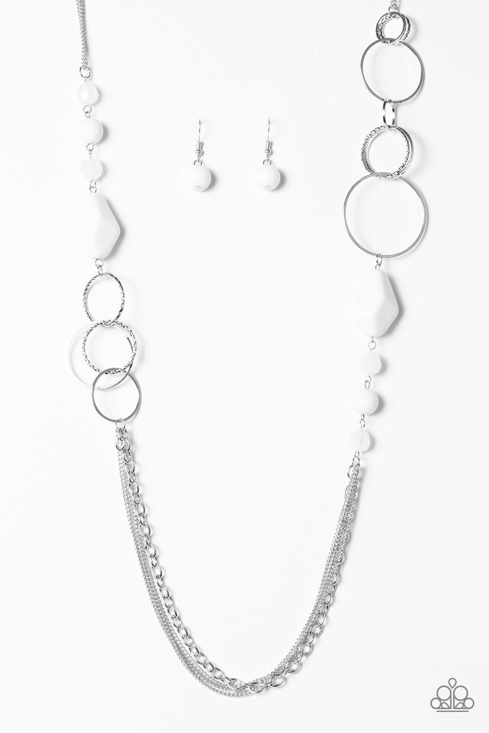 Paparazzi Accessories Wonderfully Colorful ~White Faceted and smooth white beads trickle along sections of shimmery silver hoops. The colorful beading gives way to trestles of mismatched chain, creating bold layers down the chest. Features an adjustable c