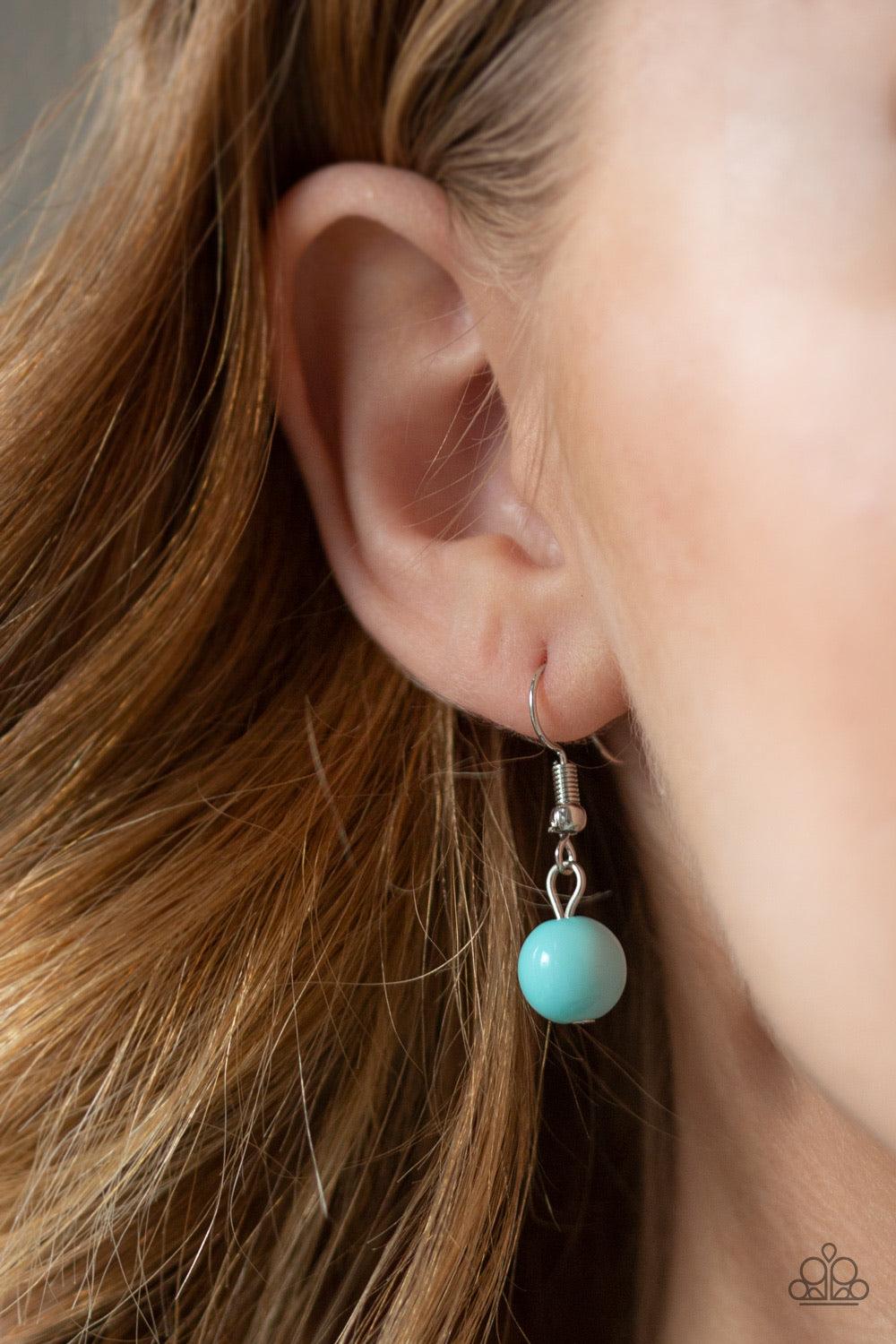 Paparazzi Accessories Seaside Soirée - Blue Hammered silver discs give way to layers of polished blue, glassy, and shiny silver beads. The colorful collection layers below the collar, creating a bubbly fringe. Features an adjustable clasp closure. Sold as