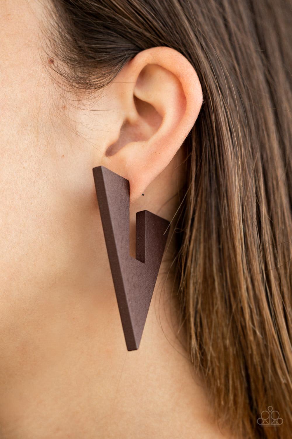 Paparazzi Accessories Boardroom Bravado - Brown Painted in an earthy brown finish, a wooden frame is cut into an edgy triangular shape for a retro vibe. Earring attaches to a standard post fitting. Hoop measures approximately 1 1/2" in diameter. Sold as o