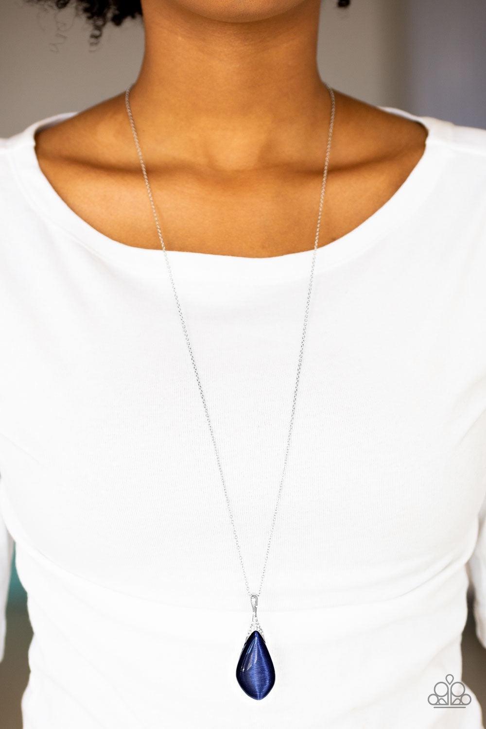 Paparazzi Accessories Friends in Glow Places - Blue Infused with a white rhinestone encrusted fitting, an asymmetrical blue moonstone swings from the bottom of an elongated silver chain for a whimsical look. Features an adjustable clasp closure. Jewelry