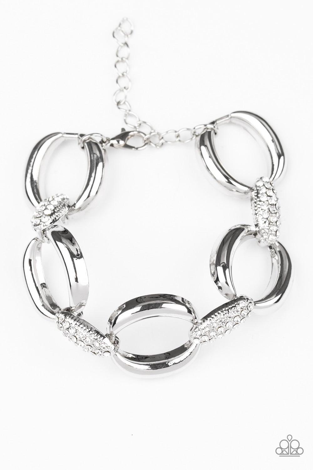 Paparazzi Accessories Don’t Forget Who’s Boss - White Bold silver links join with white rhinestone encrusted frames around the wrist for a fierce look. Features an adjustable clasp closure. Jewelry