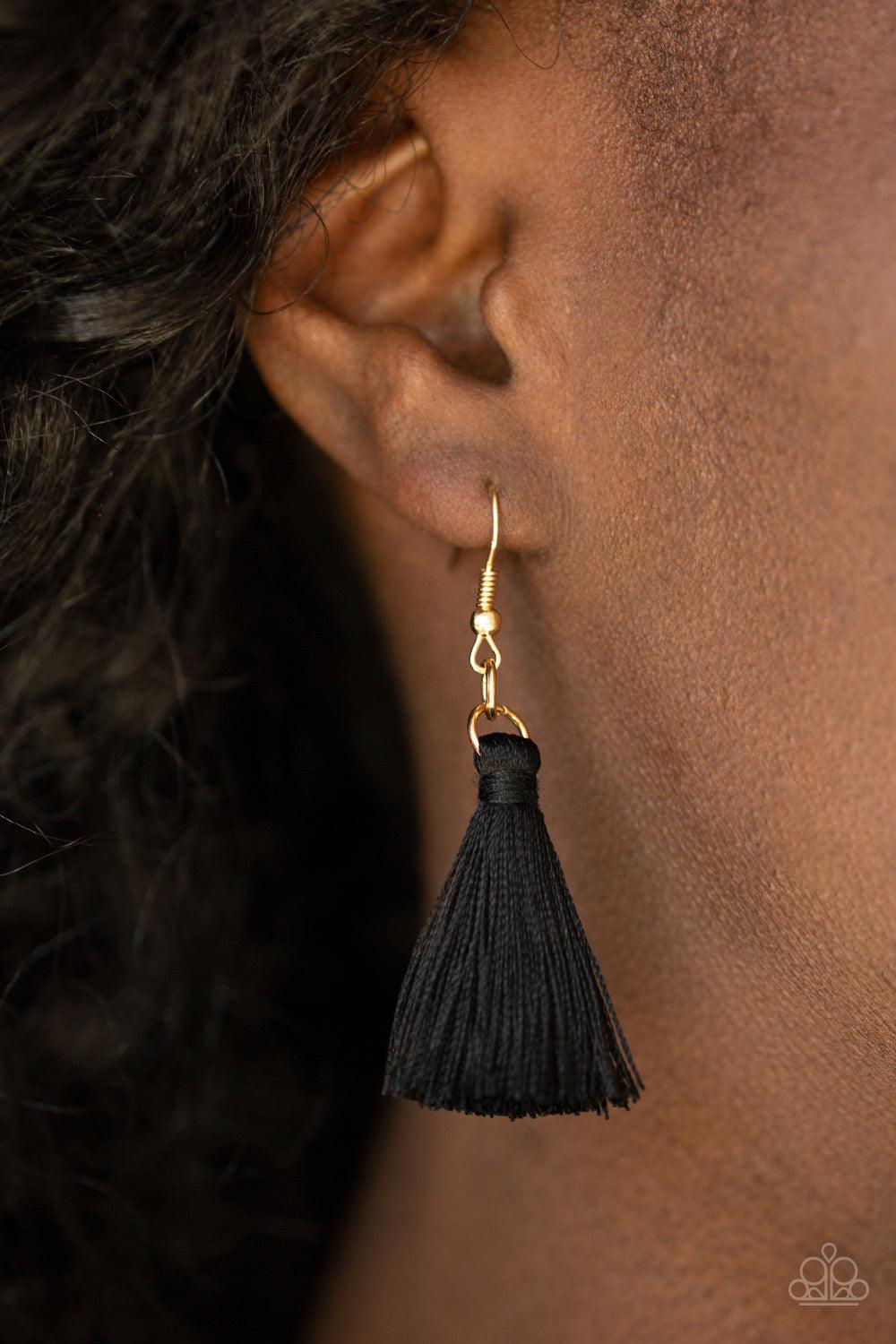 Paparazzi Accessories The MANE Event - Gold A plume of shiny black thread flares out from the bottom of an airy half-moon frame stamped in tribal inspired patterns, creating a bold fringe below the collar. Features an adjustable clasp closure. Jewelry