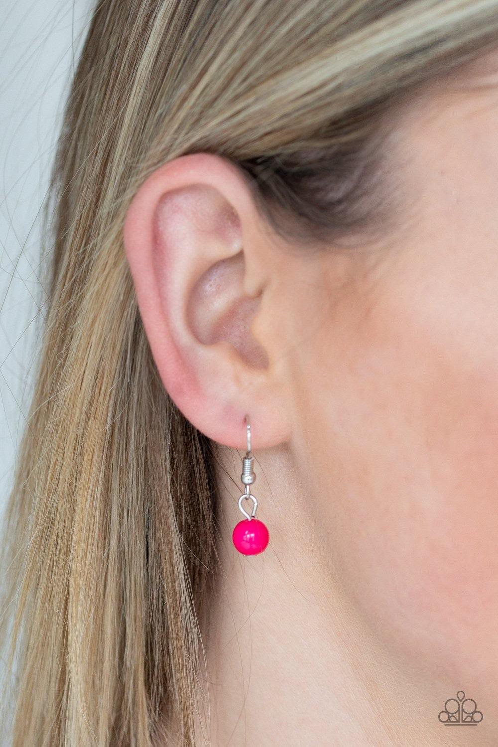 Paparazzi Accessories So Solar ~Pink A vivacious pink bead is pressed into the center of a silver medallion radiating with ornate sunburst textures for a whimsical look. Features an adjustable clasp closure.