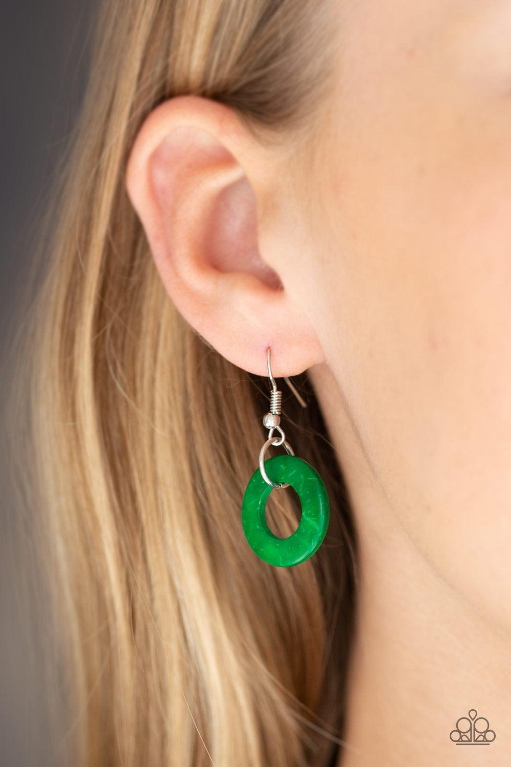 Paparazzi Accessories Bahama Drama - Green Infused with dramatic brown wooden beads, vivacious green wooden hoops are knotted in place below the collar for a summery flair. Features an adjustable sliding knot closure. Jewelry