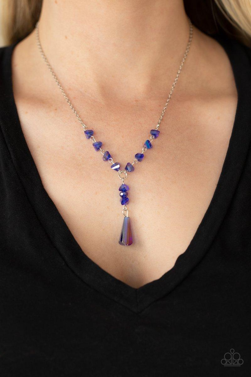 Paparazzi Accessories Olympian Oracle - Blue Featuring a blue iridescent shimmer, raw cut glassy beads trickle along a dainty silver chain, giving way to a tranquil crystal-like pendant below the collar. Features an adjustable clasp closure. Sold as one i