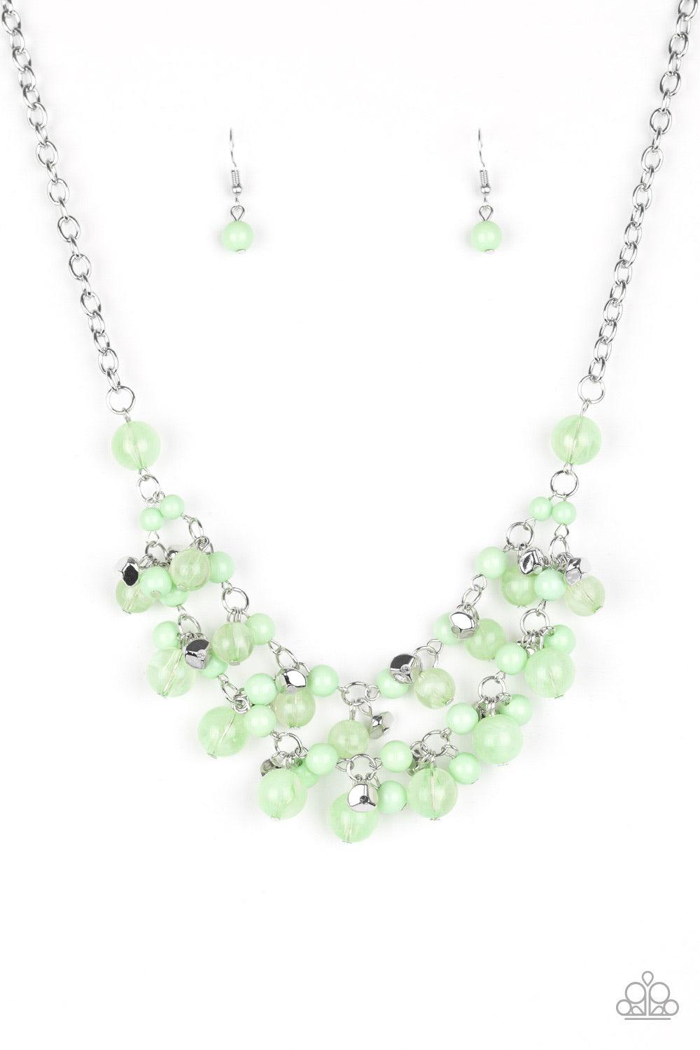 Paparazzi Accessories Gone Sailing - Green Featuring polished and cloudy finishes, refreshing Spearmint beads drip from the bottom of two shimmery silver chains below the collar. Faceted silver beads trickle between the colorful accents, adding a splash o