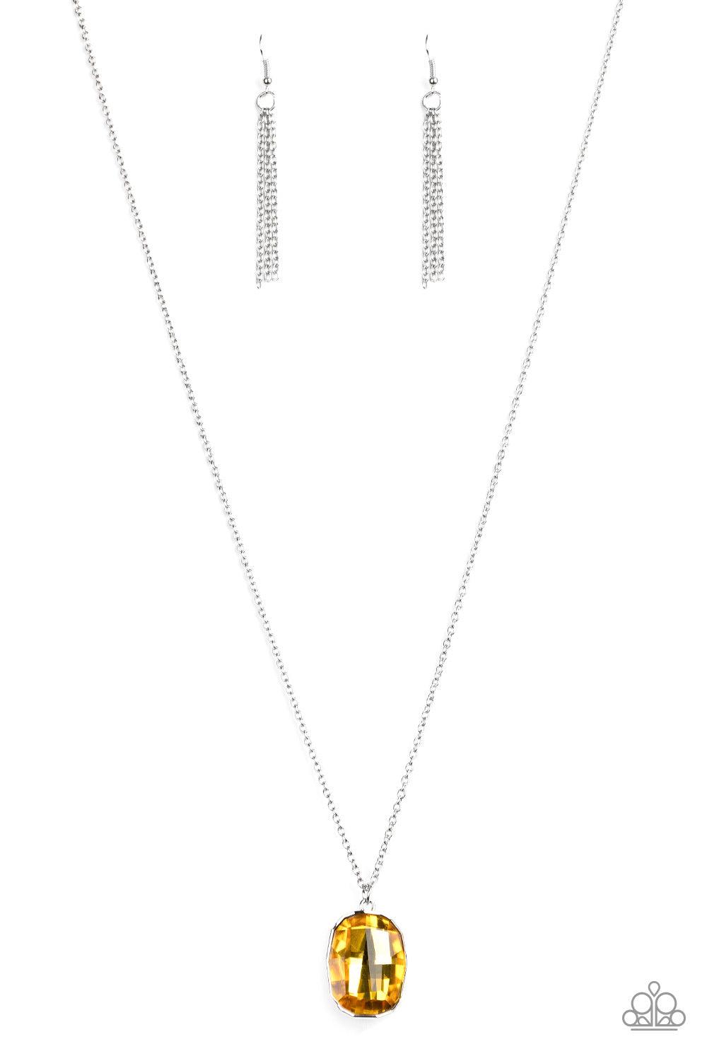 Paparazzi Accessories Imperfect Iridescent - Yellow An imperfect yellow gem is pressed into the center of an edgy silver frame at the bottom of a lengthened silver chain for a glitzy look. Features an adjustable clasp closure. Sold as one individual neckl