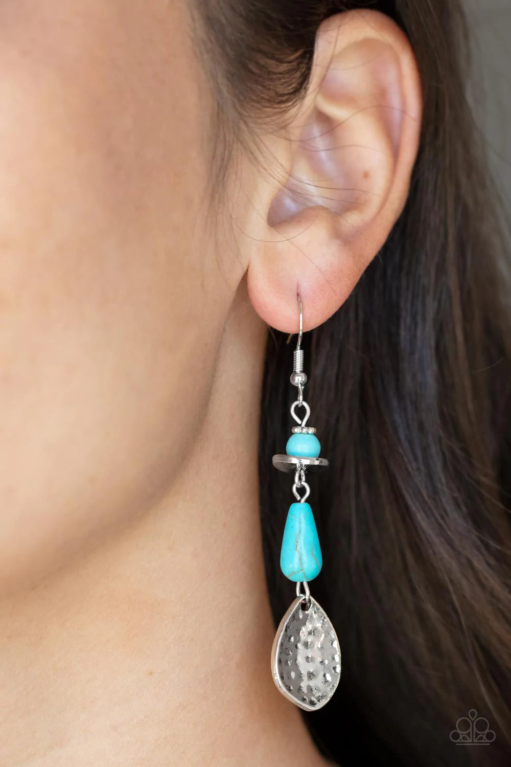 Paparazzi Accessories Artfully Artisan - Blue An abstract collection of hammered silver accents and turquoise stone beads delicately link and stack into a dainty artisan inspired lure. Earring attaches to a standard fishhook fitting. Sold as one pair of e
