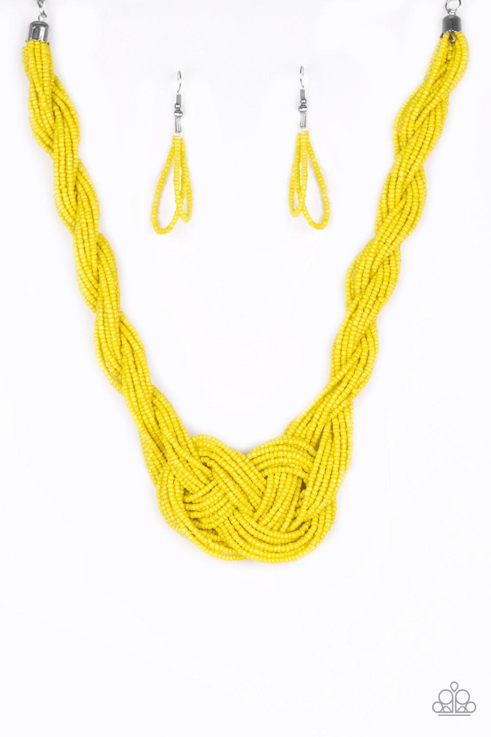 Paparazzi Accessories A Standing Ovation - Yellow Countless strands of sunny yellow seed beads are twisted and knotted together to create an unforgettable statement piece. Features an adjustable clasp closure. Jewelry