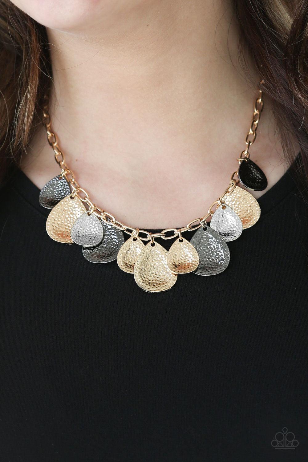 Paparazzi Accessories Storm Goddess - Multi Delicately hammered in light-catching shimmer, gold, gunmetal, and silver teardrops drip from the bottom of a glistening gold chain, creating a bold fringe below the collar. Features an adjustable clasp closure.