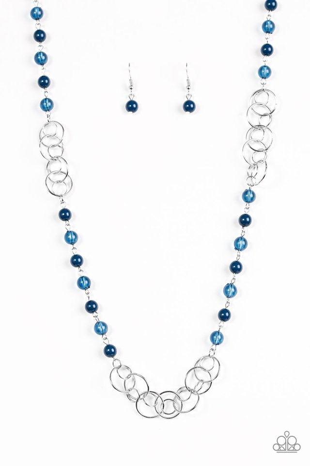 Paparazzi Accessories Dreamy Discovery - Blue Glassy and polished blue beads give way to sections of shimmery silver hoops along a glistening silver chain for a seasonal look. Features an adjustable clasp closure. Sold as one individual necklace. Includes