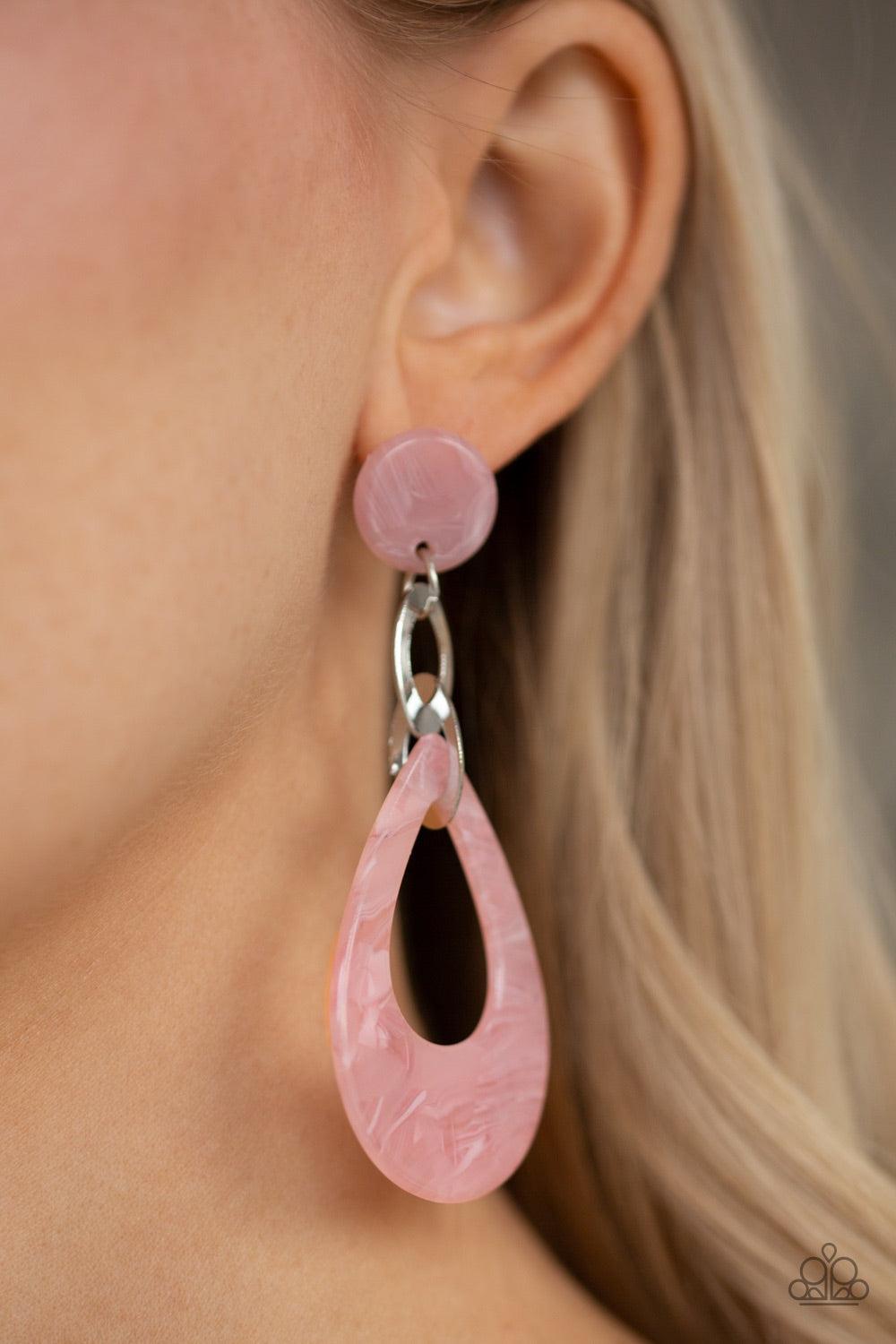 Paparazzi Accessories Beach Oasis - Pink Brushed in a faux marble finish, a pink acrylic teardrop links to a matching acrylic fitting as it swings from the ear for a summery look. Earring attaches to a standard post fitting. Jewelry