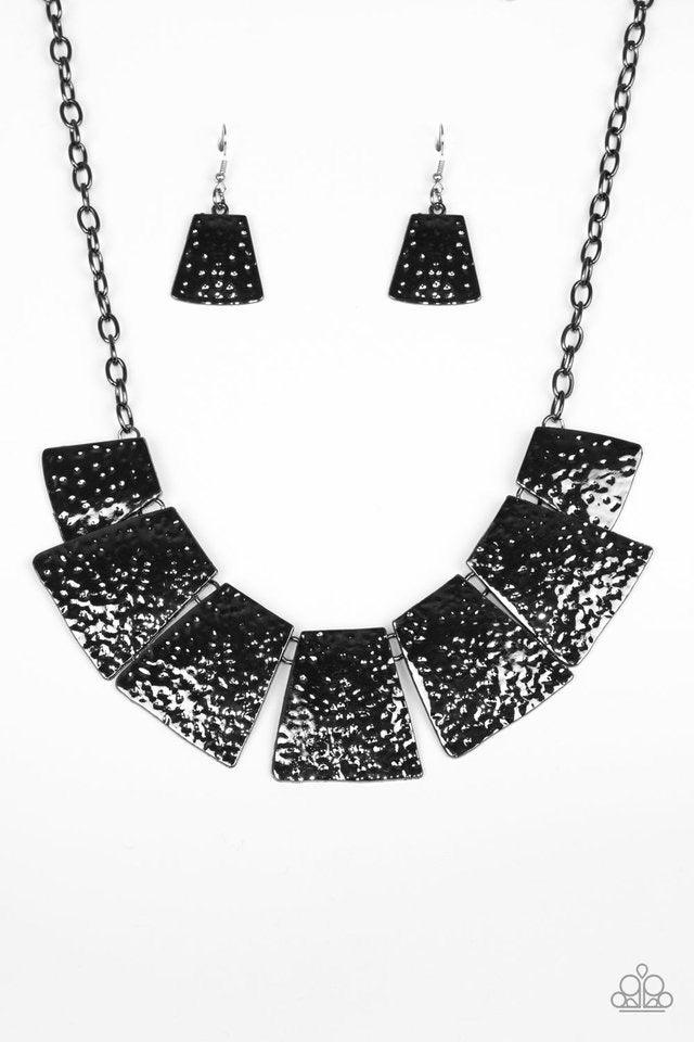 Paparazzi Accessories Here Comes The Huntress - Black Featuring flared edges, delicately hammered gunmetal plates link below the collar for a fierce look. Features an adjustable clasp closure. Sold as one individual necklace. Includes one pair of matching