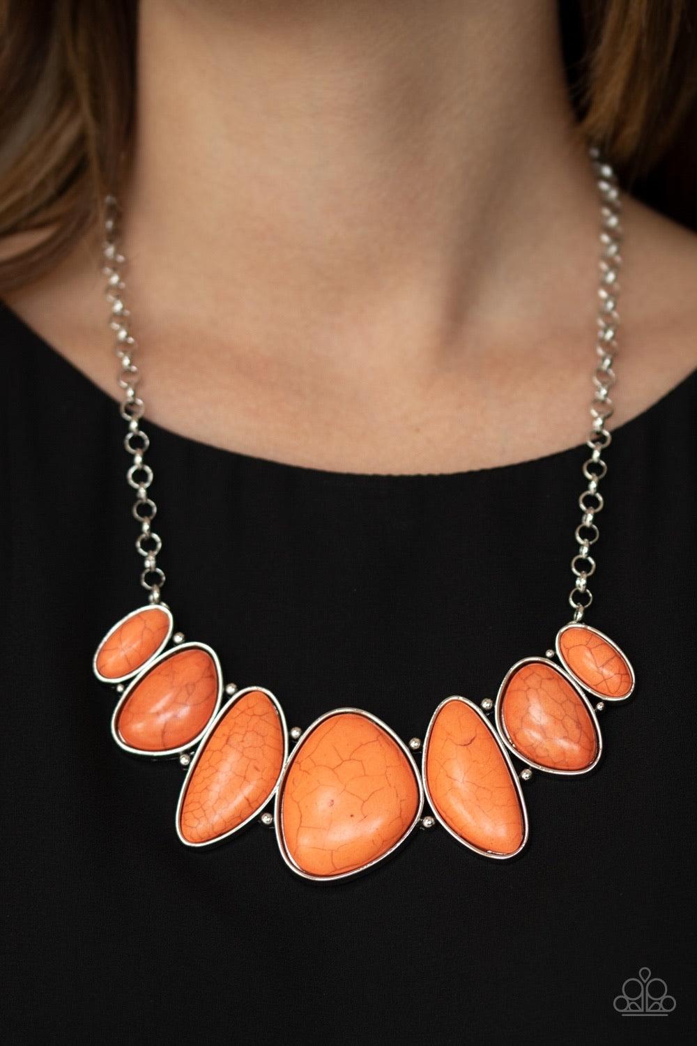 Paparazzi Accessories Primitive - Orange Robust orange stones are pressed into asymmetrical silver frames, coalescing into a bold pendant below the collar. Features an adjustable clasp closure. Sold as one individual necklace. Includes one pair of matchin