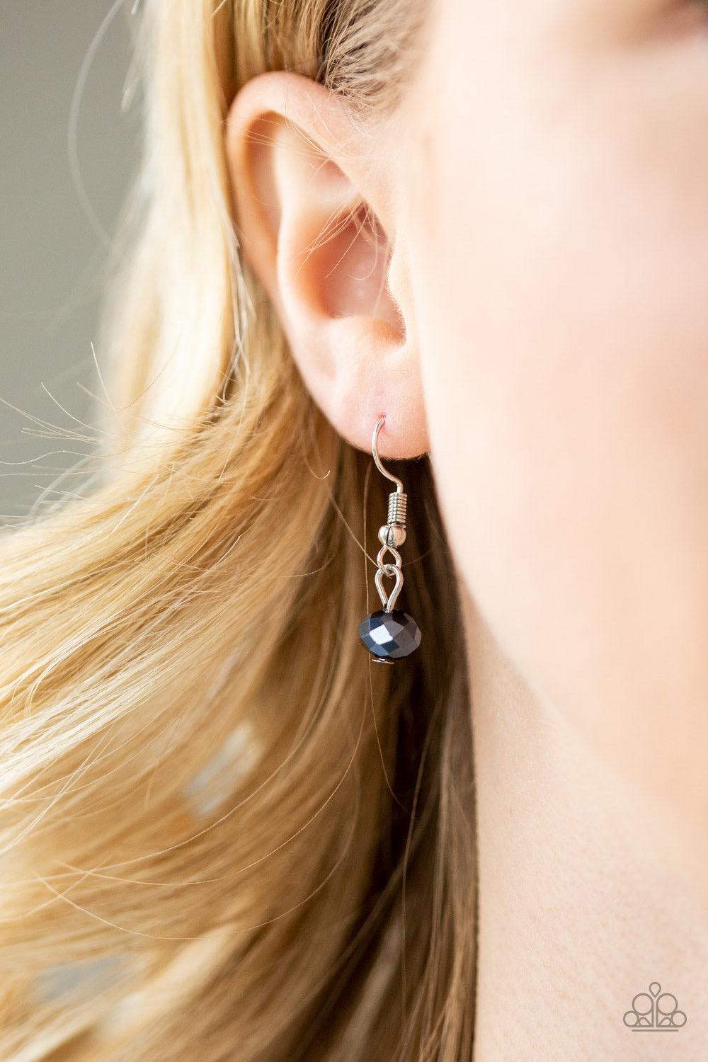 Paparazzi Accessories Color of the Day - Blue Dipped in a metallic shimmer, a strand of glittery blue crystal-like beads gives way to a strand of shiny silver beads below the collar for a colorfully layered look. Features an adjustable clasp closure. Jewe
