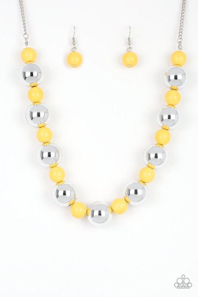 Paparazzi Accessories Top Pop - Yellow Polished yellow beads and dramatic silver beads drape below the collar for a perfect pop of color. Features an adjustable clasp closure. Jewelry