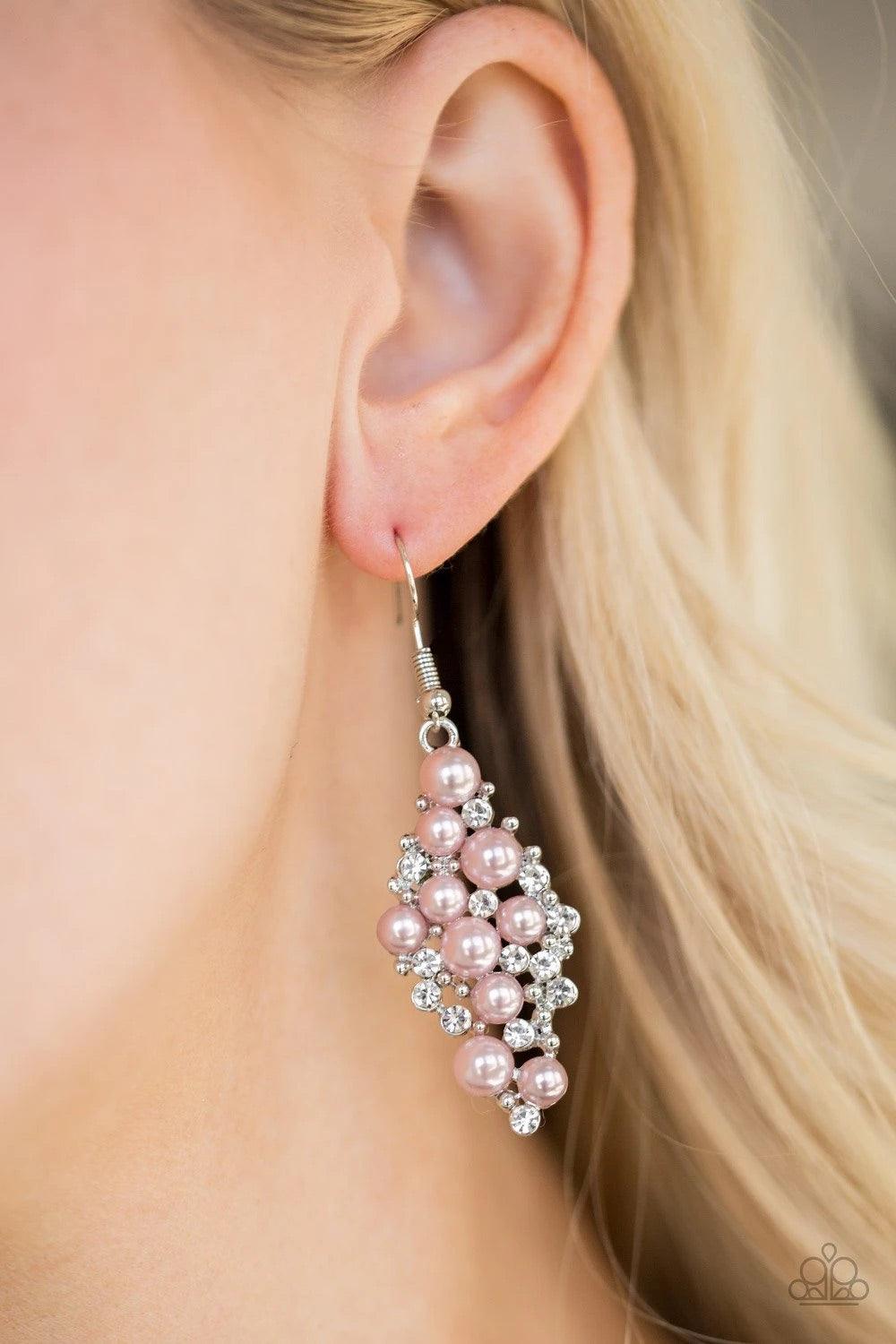Paparazzi Accessories Famous Fashion - Pink Bubbly pink pearls, dainty silver studs, and radiant white rhinestones coalesce into an elegant lure. Earring attaches to a standard fishhook fitting. Sold as one pair of earrings. Jewelry