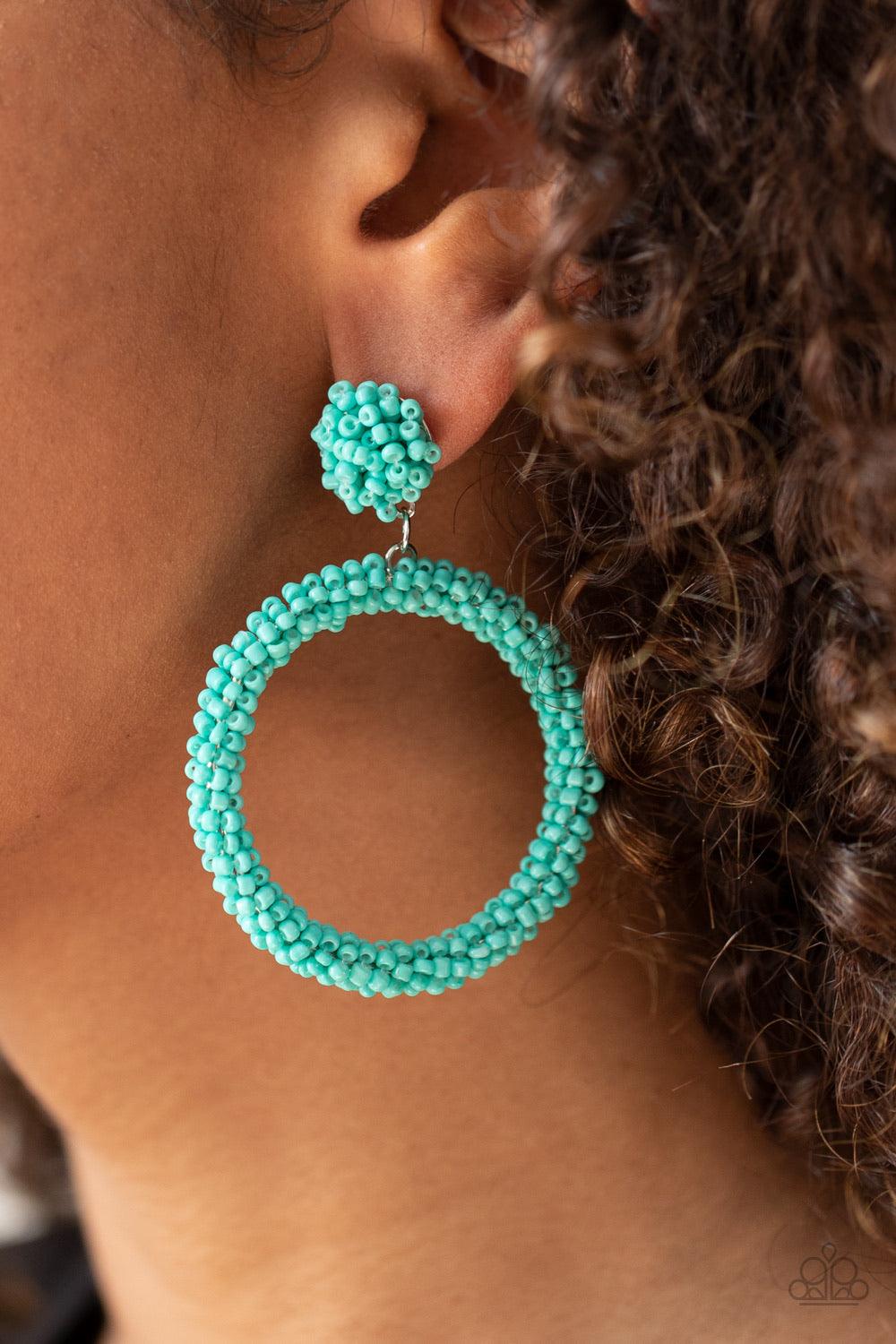Paparazzi Accessories Be All You Can BEAD - Blue A refreshing collection of dainty turquoise seed beads are woven around a circular frame at the bottom of a matching beaded fitting, creating a colorful hoop. Earring attaches to a standard post fitting. So