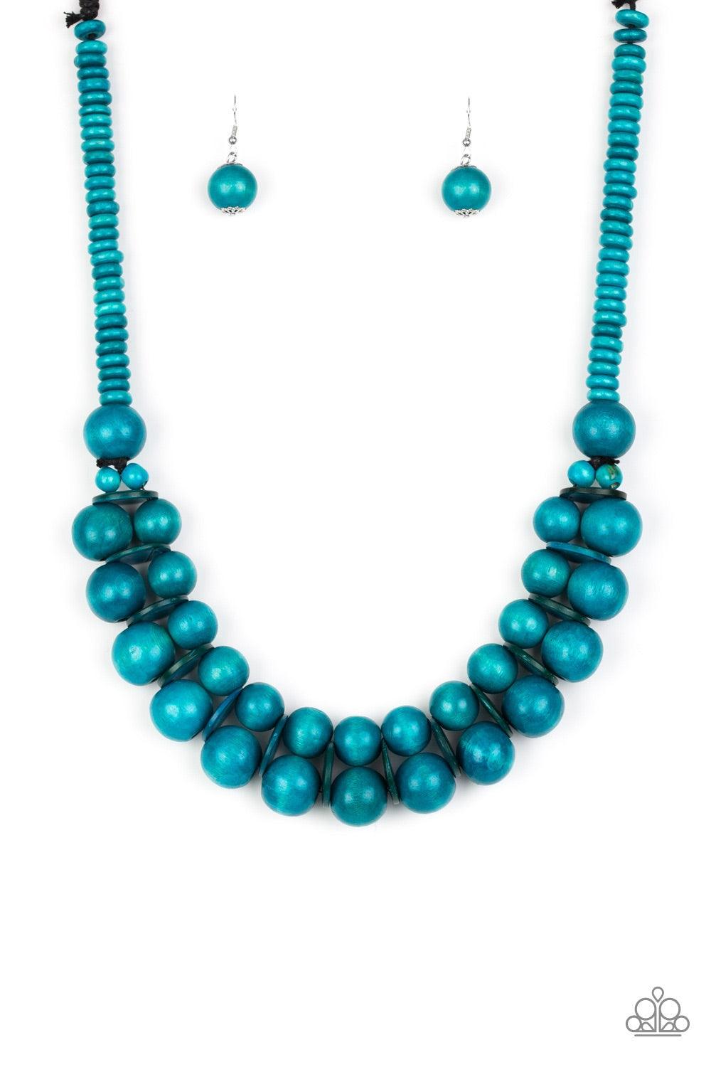 Paparazzi Accessories Caribbean Cover Girl - Blue Brushed in a distressed finish, refreshing blue wooden beads and discs join below the collar for a summery look. Features a button loop closure. Jewelry