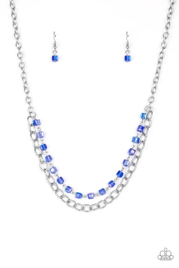 Paparazzi Accessories Block Party Princess - Blue A strand of iridescent blue crystal-like cube beading joins a classic strand of silver chain below the collar, creating refined layers. Features an adjustable clasp closure. Sold as one individual necklace