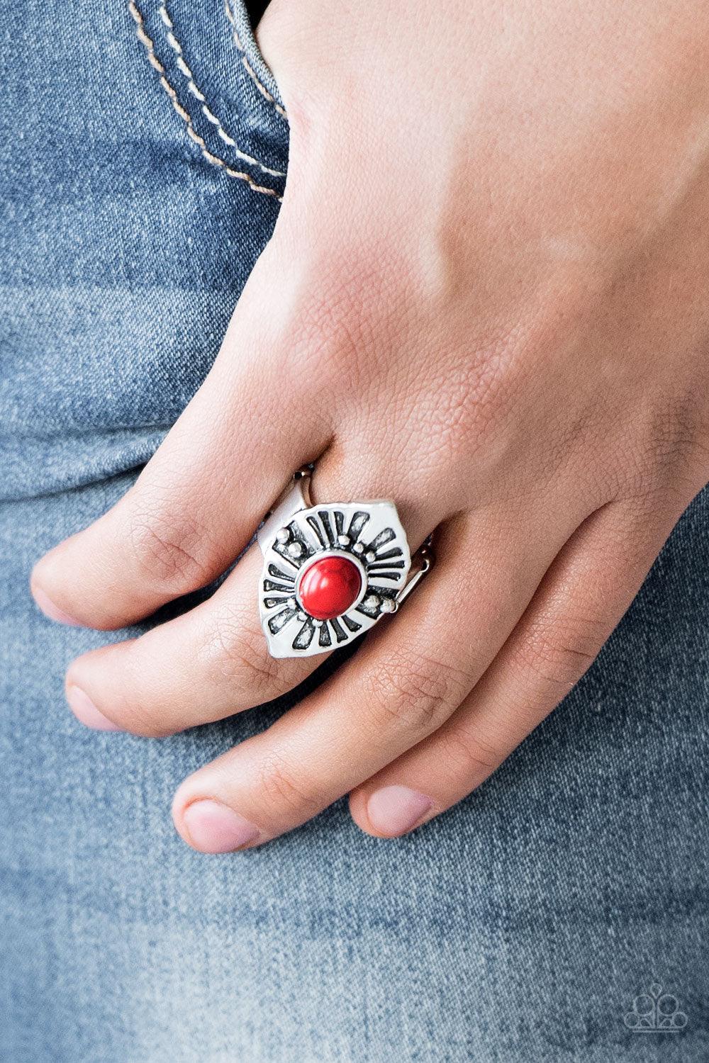 Paparazzi Accessories HOMESTEAD For The Weekend - Red A fiery red stone bead is pressed into the center of an angular silver frame radiating with studded and antiqued textures. Features a stretchy band for a flexible fit. Sold as one individual ring. Jewe