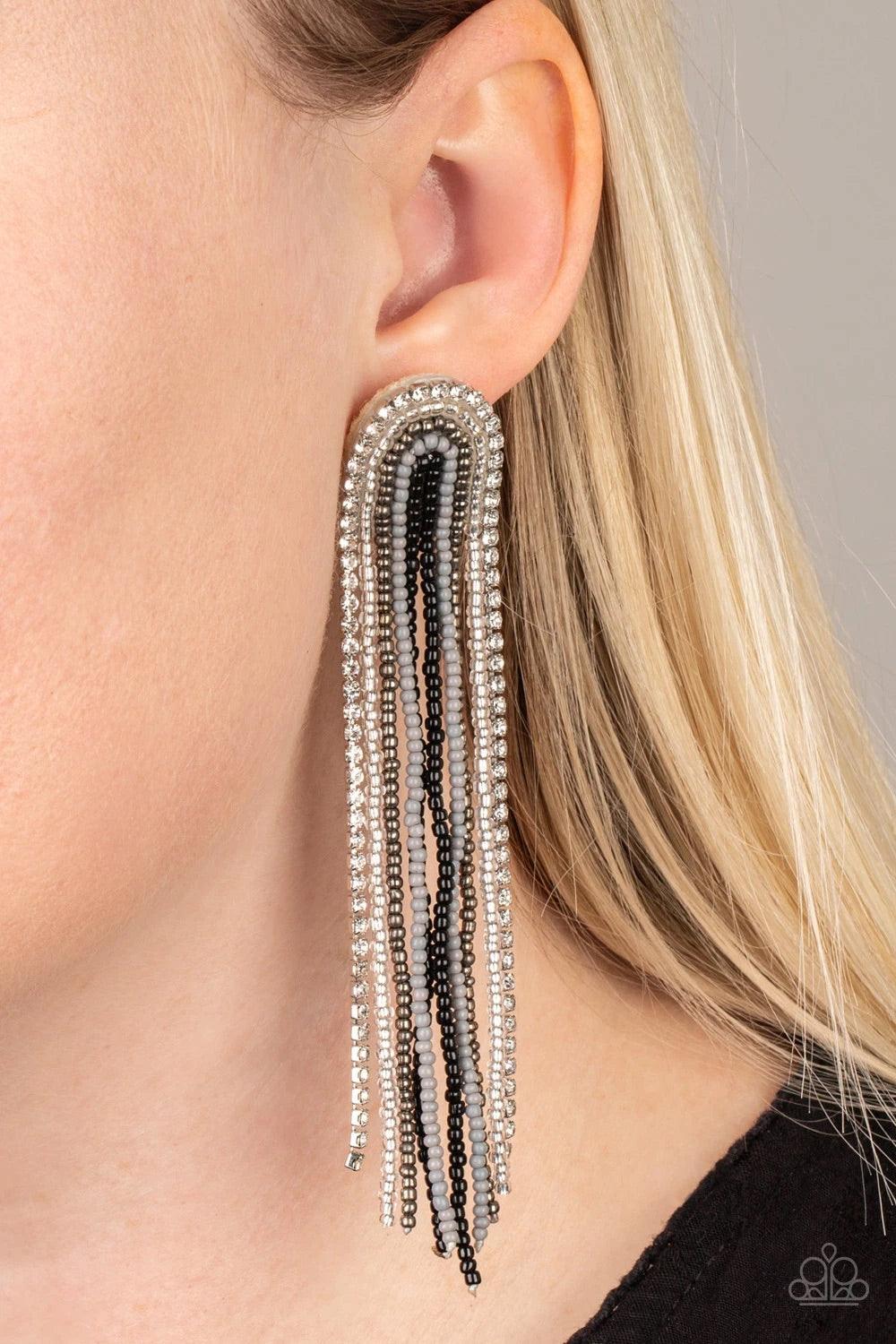 Paparazzi Accessories Let There BEAD Light - Black Mismatched strands of black, silver, gray, clear, and gunmetal seed beads and a glittery strand of white rhinestones delicately curls into a beaded rainbow-like tassel. Earring attaches to a standard post