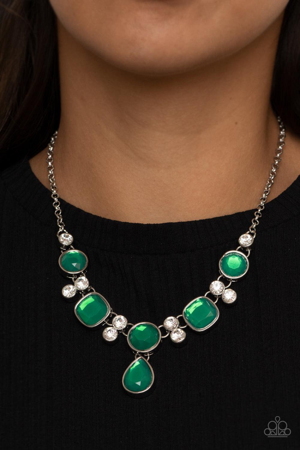 Paparazzi Accessories Crystal Cosmos - Green Pairs of glittery white rhinestones, join a sparkly collection of round, square, and dewy teardrop green rhinestones below the collar for a timeless look. Features an adjustable clasp closure. Sold as one indiv