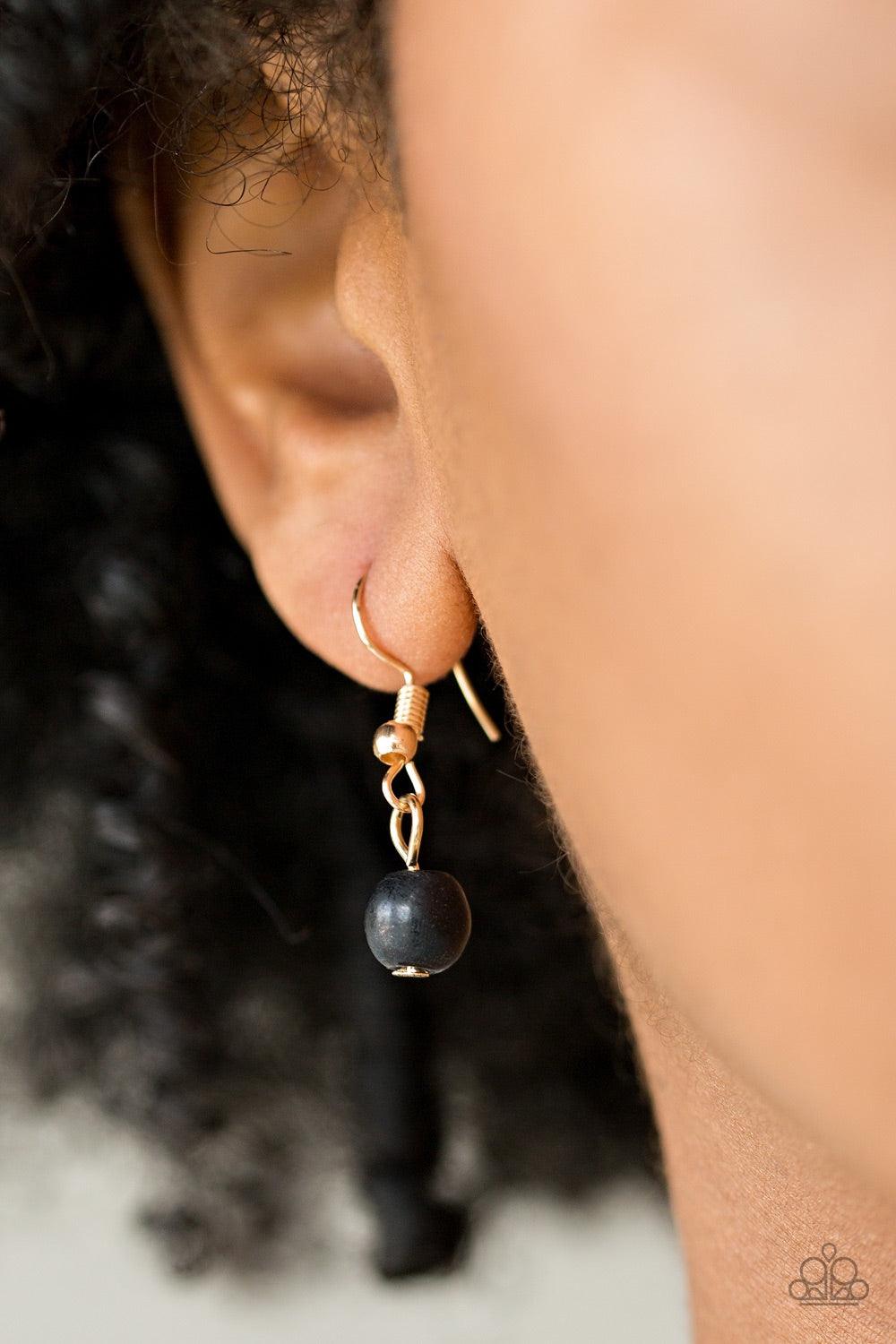 Paparazzi Accessories Basic Groundwork - Black Chiseled into flared teardrop shapes, a dainty fringe of black stones and golden beads gives way to a large stone pendant, creating earthy layers down the chest. Features an adjustable clasp closure. Jewelry