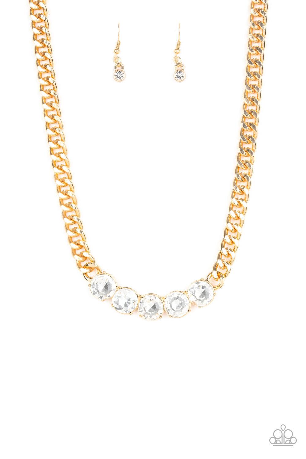 Paparazzi Accessories Rhinestone Renegade - Gold A thick gold chain gives way to a dramatic row of glittery white rhinestones, creating a bold and blinding statement below the collar. Features an adjustable clasp closure. Jewelry