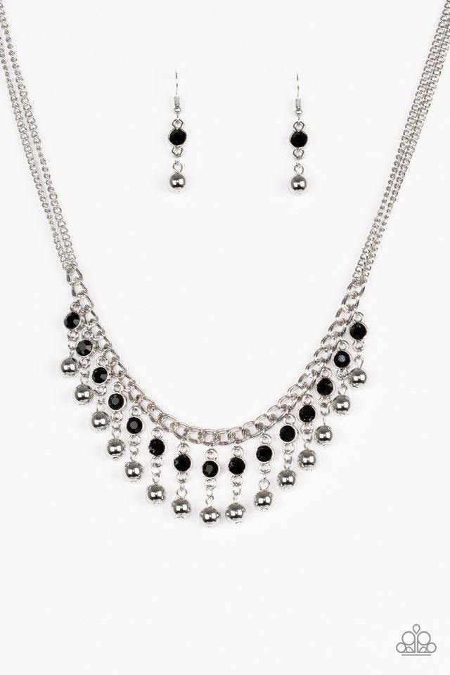 Paparazzi Accessories Pageant Queen - Black Sparkling black rhinestones drip from the bottom of a bold silver chain. Classic silver beads swing from the bottoms of the glittery rhinestones, creating a glamorous fringe below the collar. Features an adjusta