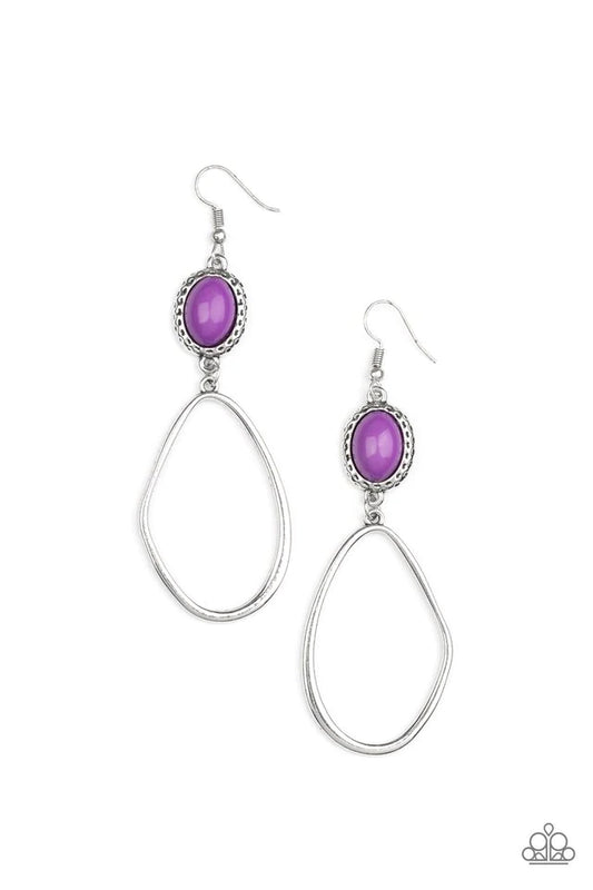 Paparazzi Accessories Adventurous Allure - Purple An asymmetrical silver oval swings from the bottom of a purple beaded silver frame featuring hammered textures, creating a colorfully rustic lure. Earring attaches to a standard fishhook fitting. Sold as o
