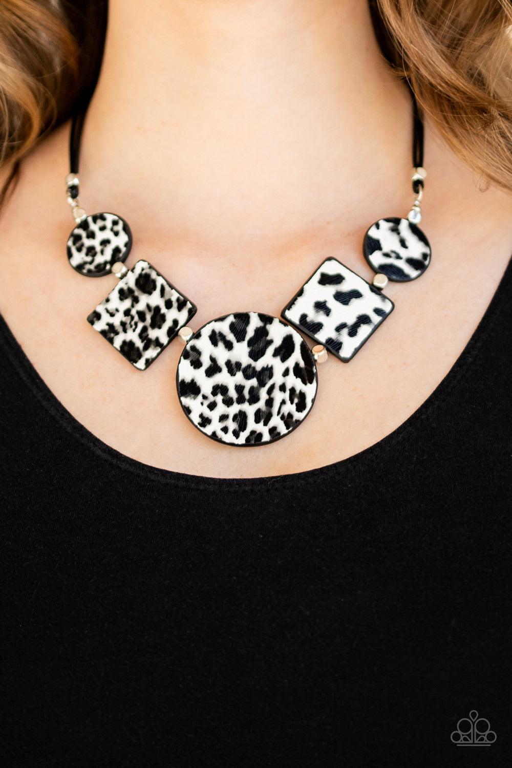 Paparazzi Accessories Here Kitty Kitty - White Featuring textured white and gray cheetah print, a wild collection of circle and square leather pieces are threaded along an invisible wire below the collar for a fierce look. Features an adjustable clasp clo
