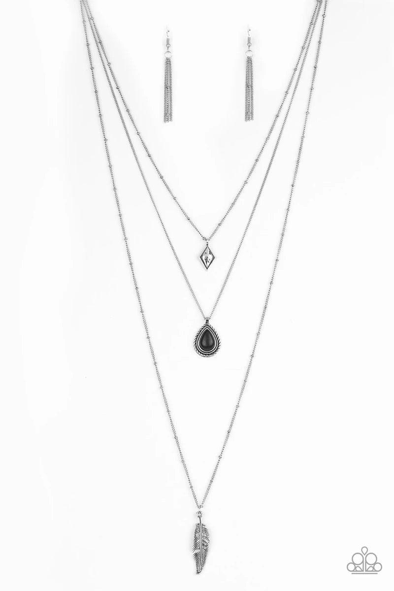 Paparazzi Accessories Fly The Coop - Black A dainty diamond shaped frame, black stone teardrop, and life-like silver feather charms layer down the chest for a seasonal look. Features an adjustable clasp closure. Sold as one individual necklace. Includes o