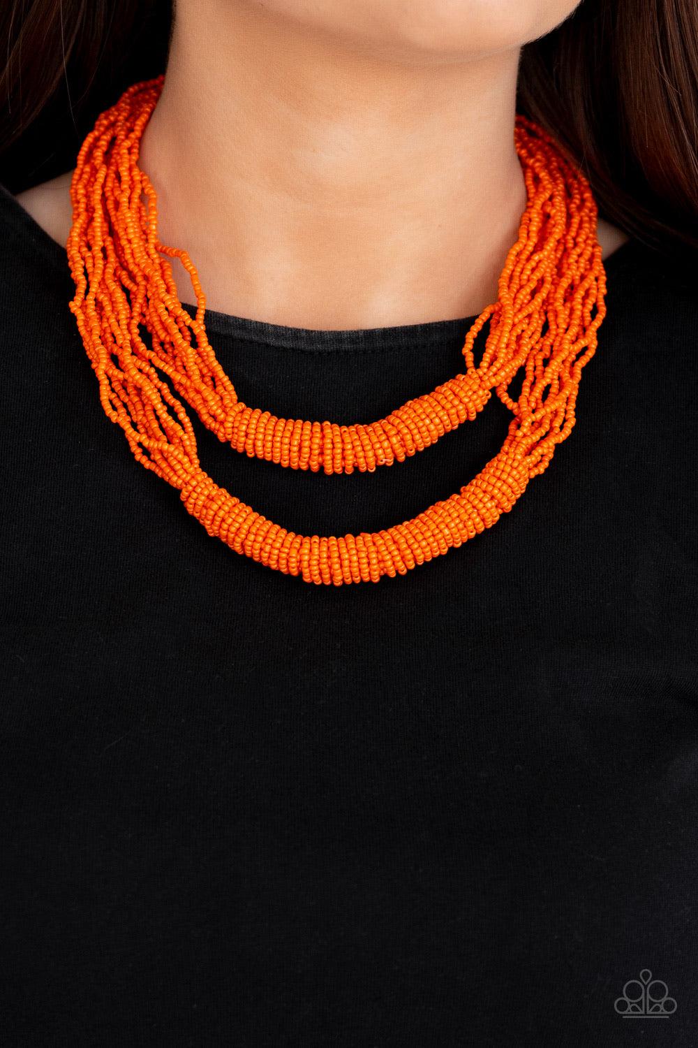 Paparazzi Accessories Right As RAINFOREST - Orange Countless layers of vivacious orange seed beads drape below the collar. Additional strands of orange seed beads wrap around the center of the layers, creating two bulky rows for a seasonal flair. Features